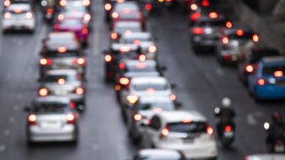 Busy crowded traffic jam on the road
