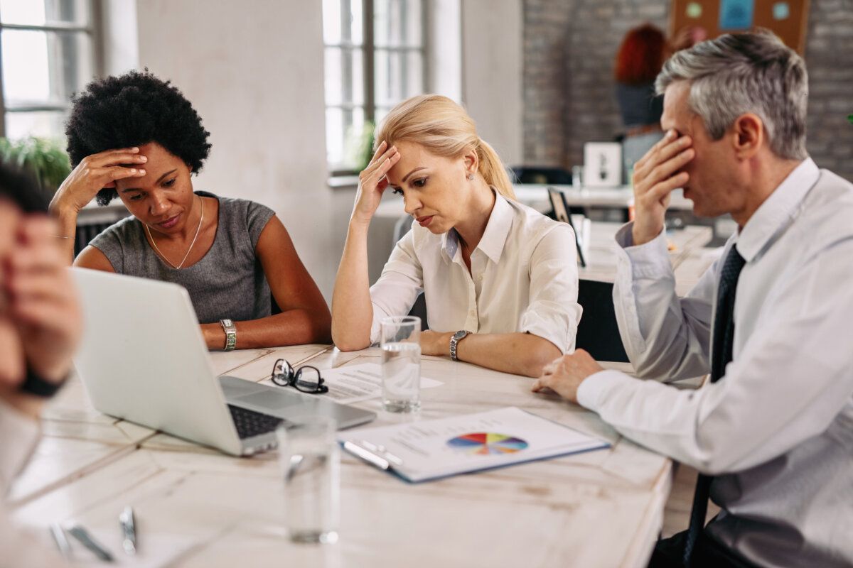 Worried business people working in the office