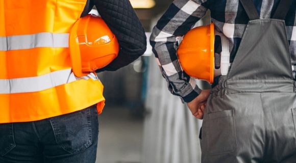 Two colleagues at a factory