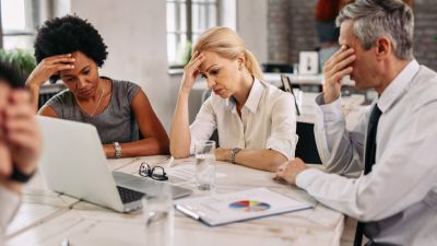 Worried business people working in the office