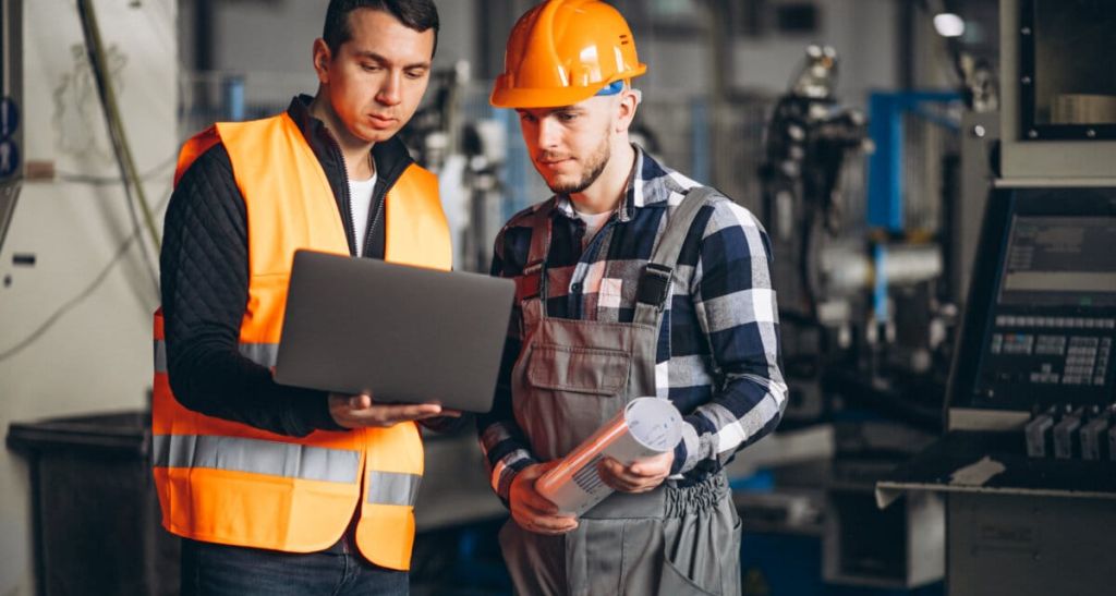 Two colleagues at a factory
